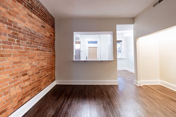 Contemporary finishes include wood and tile flooring
